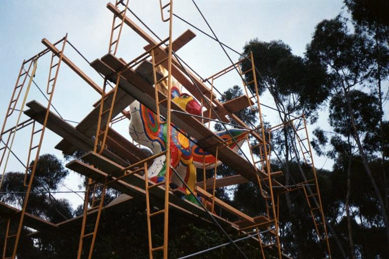 Scaffolding is in place around the Sun God sculpture at UC San Diego at some point during my time there before 2001.